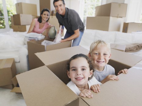 Moving van and packed boxes prepared for house removals in Fulham