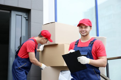 Loading household furniture into a removal van in Fulham