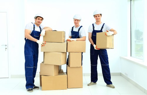 Student removals team loading boxes in Fulham