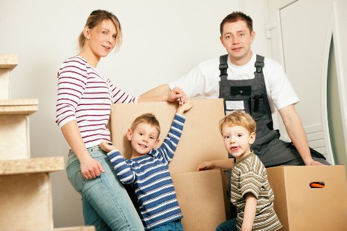 Packed boxes and furniture prepared for a Fulham house move