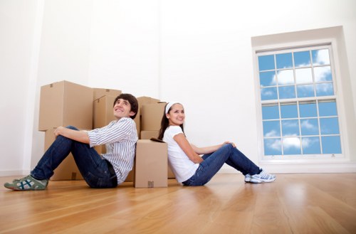 Packed moving boxes prepared for flat removals in Fulham