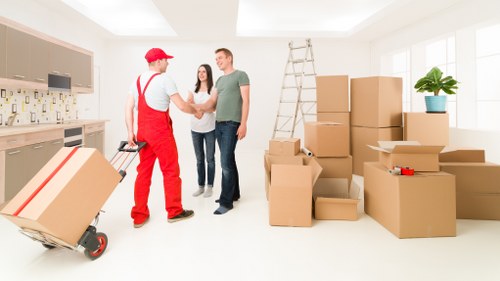 Fulham removals staff organizing furniture for transport